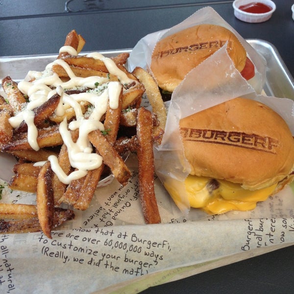 Photo taken at BurgerFi by Andres B. on 8/19/2013