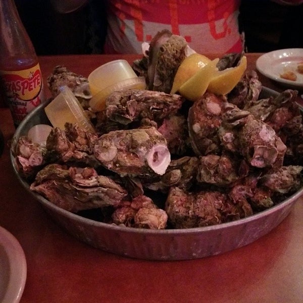 Photo taken at Dirty Don&#39;s Oyster Bar &amp; Grill by Charles E. on 1/1/2014