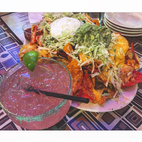 Photo taken at Sunset Cantina by Rachel L. on 8/22/2015