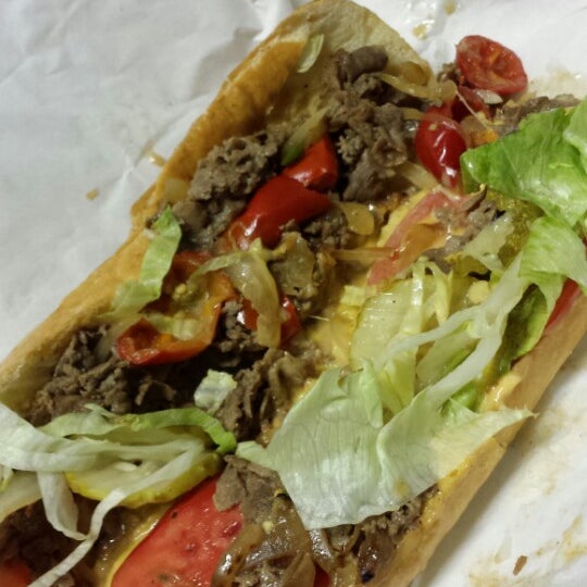 Photo taken at Busters Cheesesteak by sanderson b. on 7/25/2013