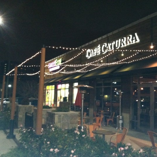 รูปภาพถ่ายที่ Cafe Caturra โดย John H. เมื่อ 12/7/2012