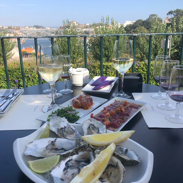 You can take your drinks from the tasting room to the terrace to get a bite and enjoy the view. And the food is actually very good: tuna and  stuffed calamari!