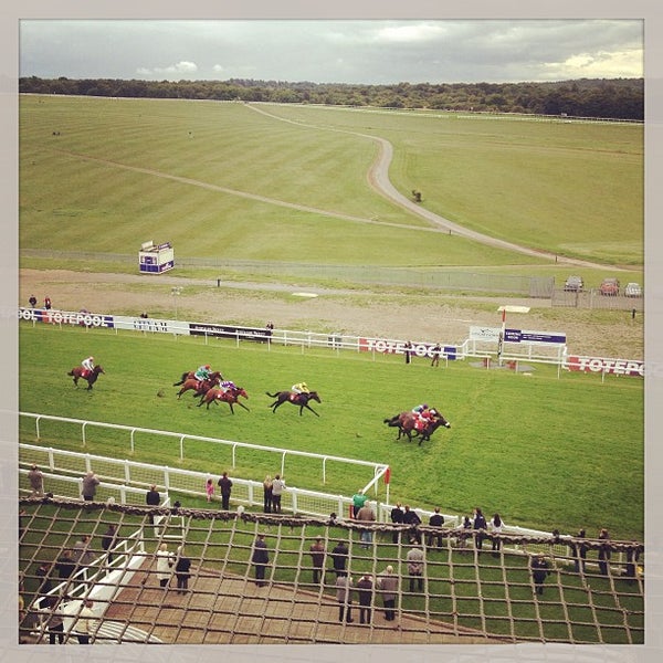 Photo taken at Epsom Downs Racecourse by КIrill N. on 9/12/2013