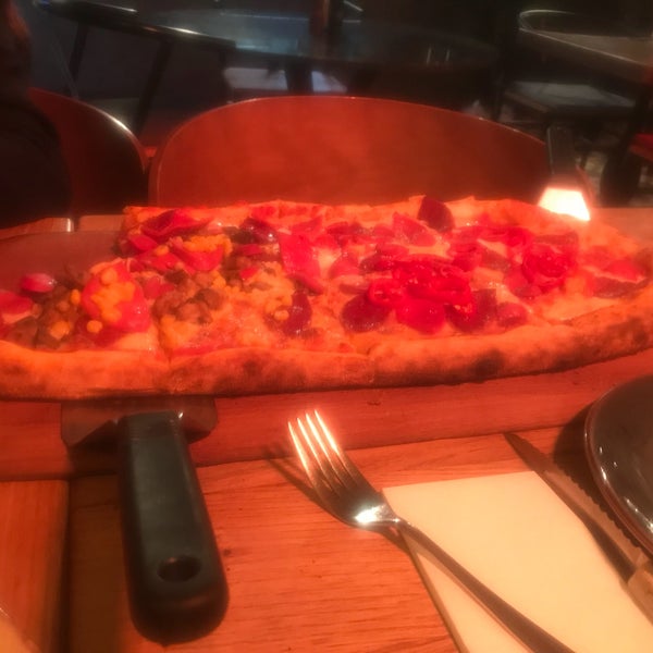 Photo taken at Metre Pizza by Yeliz D. on 4/15/2018