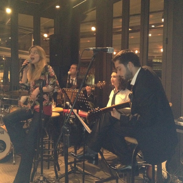Photo taken at The Sir Winston Brasserie by Aysel E. on 2/27/2013