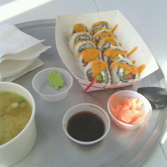 Photo taken at Rollbotto Sushi by April F. on 11/12/2012