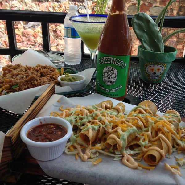 Photo taken at Greengo&#39;s Caribbean Cantina by Clarence M. on 1/16/2013