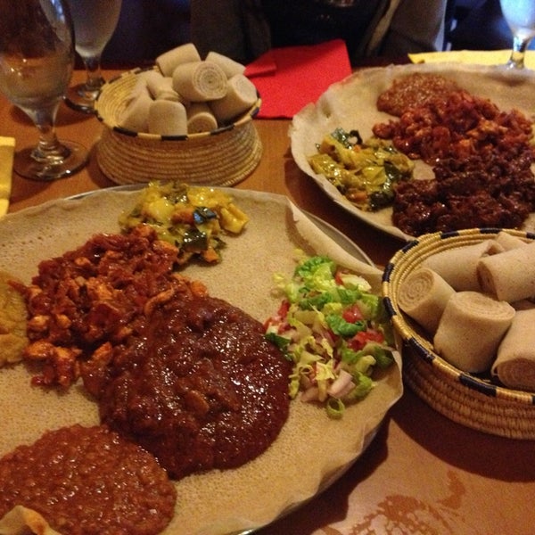 Photo taken at Lalibela Ethiopian Restaurant by Gina C. on 8/8/2013