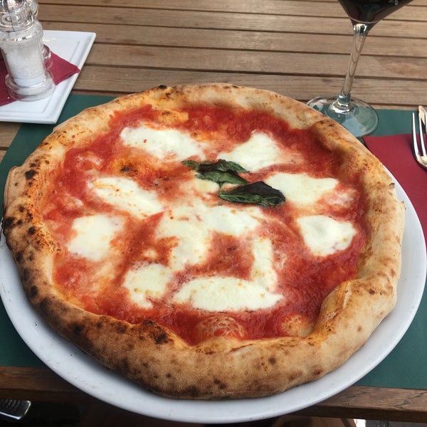 They’re in the top 50 pizzerias in Europe and this place is always full of Italians. Says enough! Try the bufalina, by far the best pizza I ever ate. The staff is lovely. Reservation required. 