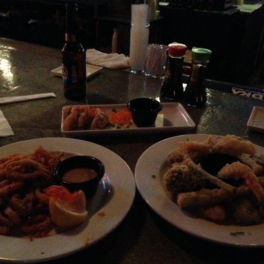 Photo taken at Koko Sushi Bar &amp; Lounge by Patrick O. on 12/22/2012