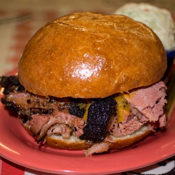 On Wednesdays, this BBQ shop serves up a pretty darned delicious pastrami sandwich. The meat is impressively smokey, thick-cut, & well-spiced. I just found it just a touch dry. WinstonWanders.com