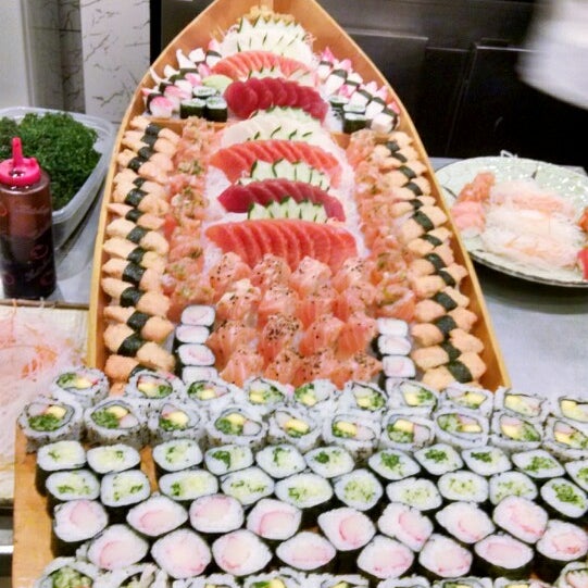 Photo taken at Sushi Mart by Junior N. on 7/16/2014