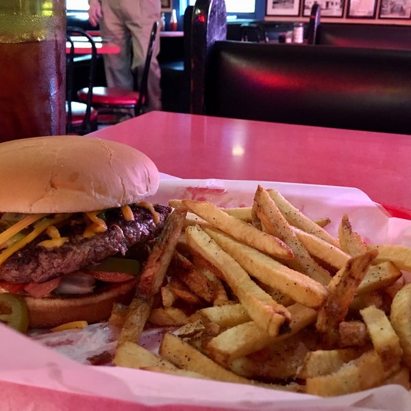 Photo taken at Hut&#39;s Hamburgers by T. Frank S. on 10/14/2019