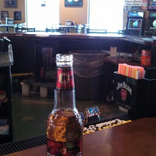 Photo taken at Champion&#39;s Sports Bar and Grill by Bridget T. on 4/11/2013