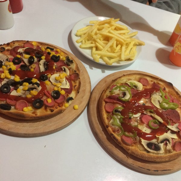 Photo taken at Pasaport Pizza by Alper K. on 1/7/2019