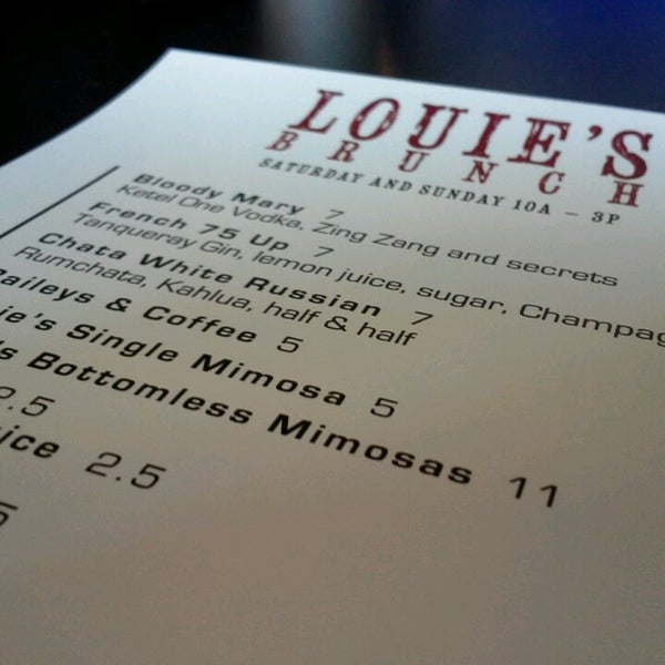 Foto tirada no(a) Louie&#39;s Wine Dive por Christina K. em 2/24/2013
