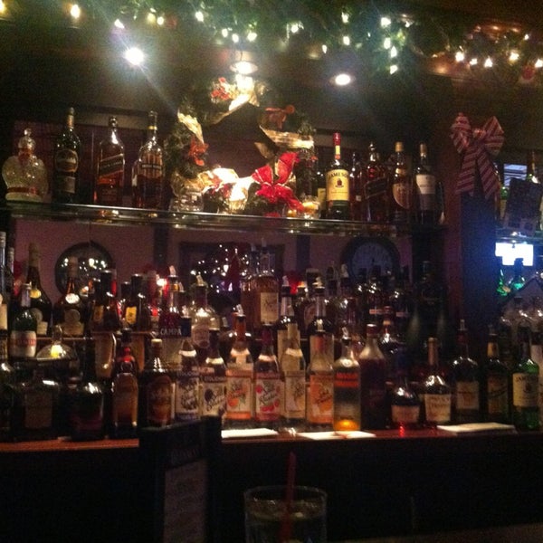 Photo taken at Mulligan&#39;s Pub by J.P. E. on 12/20/2012