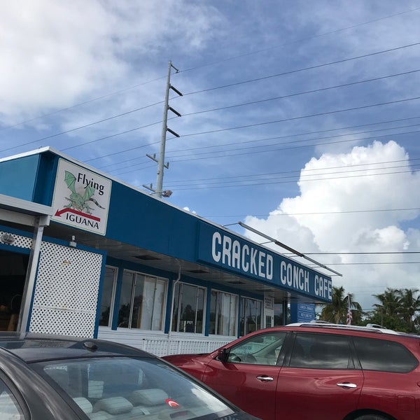 Photo taken at Cracked Conch Cafe by Evie S. on 1/3/2019