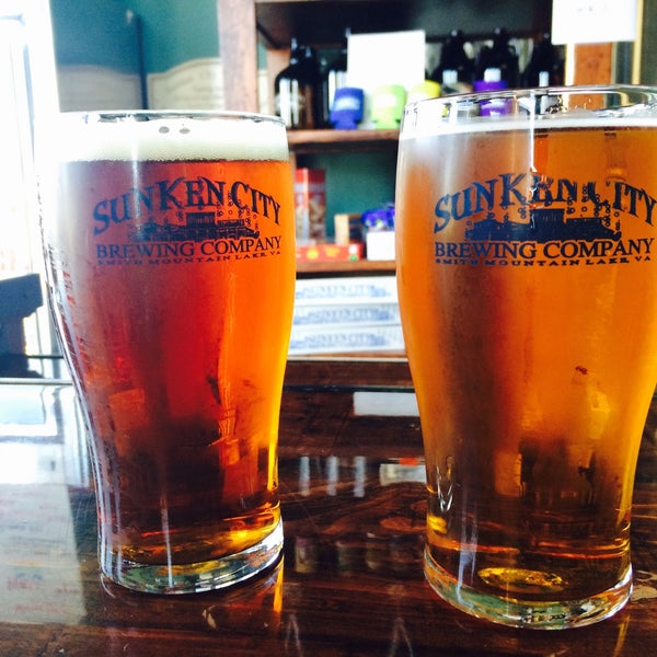 Photo taken at Sunken City Brewing Company and Tap Room by Angie V. on 5/25/2015
