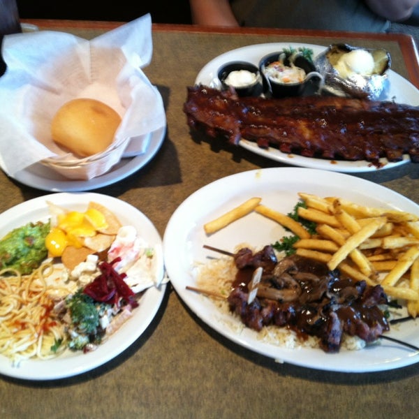 Photo taken at Sizzler by Christina H. on 7/5/2013