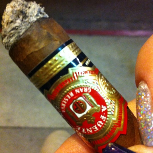 Photo taken at Cigars by Chivas by Jacqueline G. on 12/4/2012