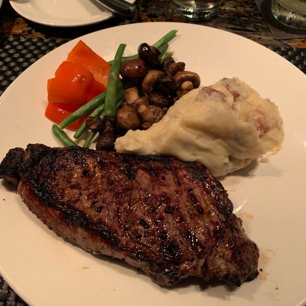 Photo taken at The Keg Steakhouse + Bar - Dunsmuir by BRENT S. on 7/23/2019