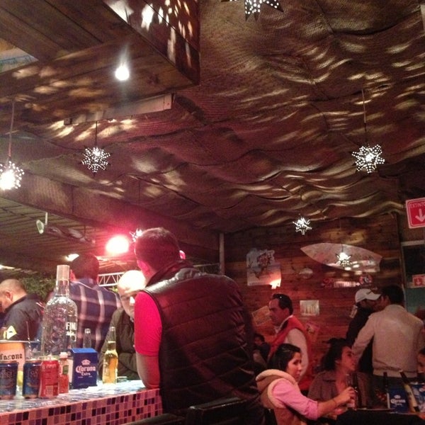 Photo taken at El Muelle Seafood Bar by J Eduardo I. on 1/25/2013