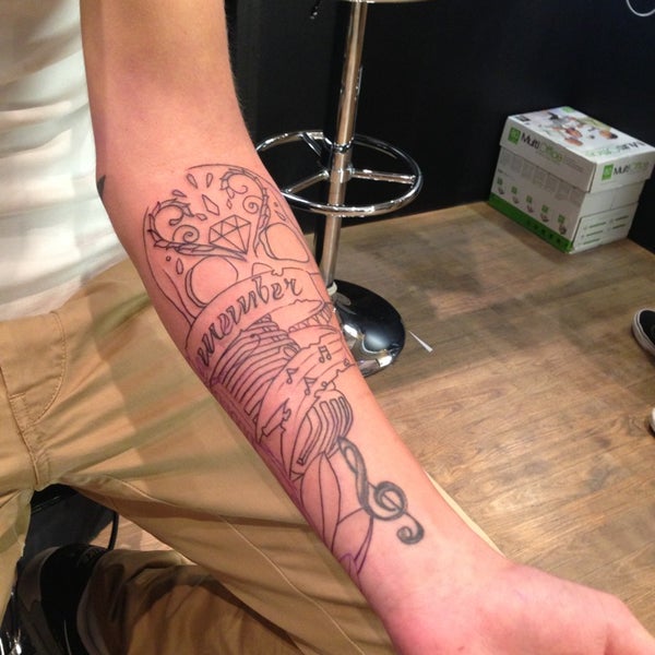 Kaina tattoo and shop body piercing