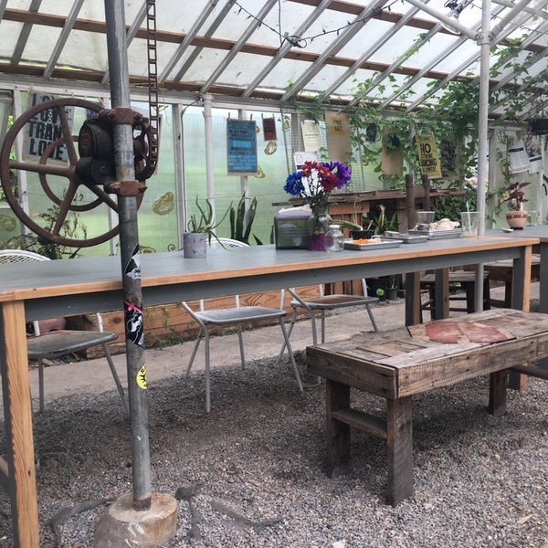 It’s is a restaurant made out of a greenhouse. Therefor there’s gravel and dirt but it’s still very hip and quaint. They mainly sell biscuits and drinks. We loved it.