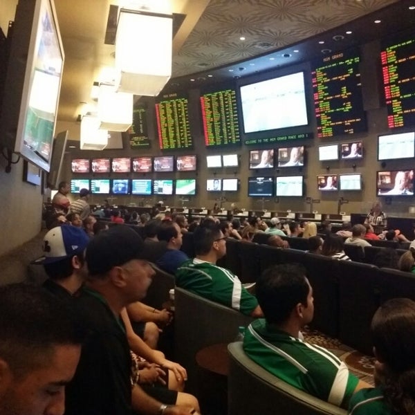Photo taken at Race &amp; Sports Book by Juana E. on 6/29/2014