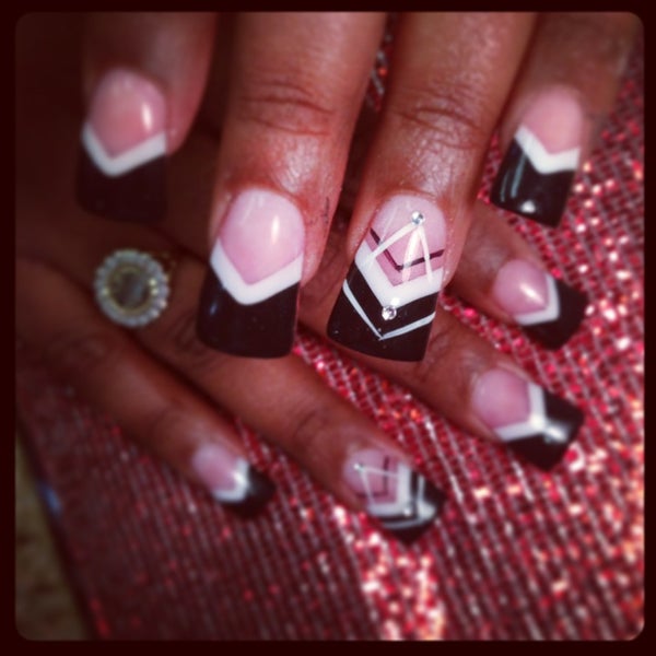 Photo taken at The Haute Spot Nail Boutique by David V. on 3/9/2013