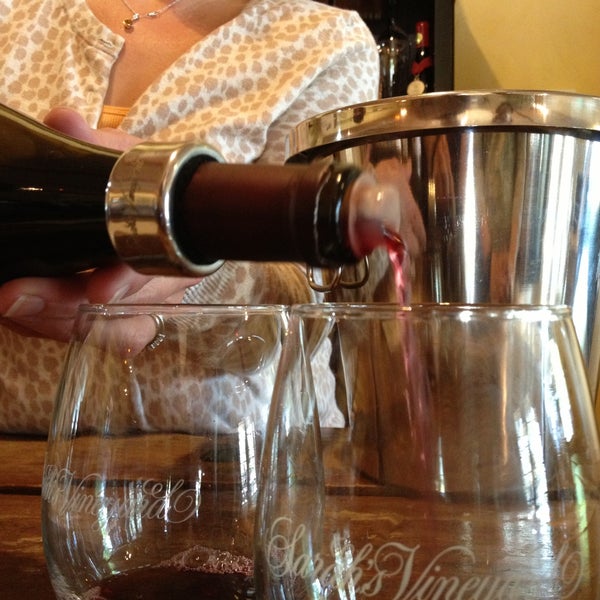 Photo taken at Sarah&#39;s Vineyard Wine Tasting and Wine Shop by Greg M. on 4/27/2013