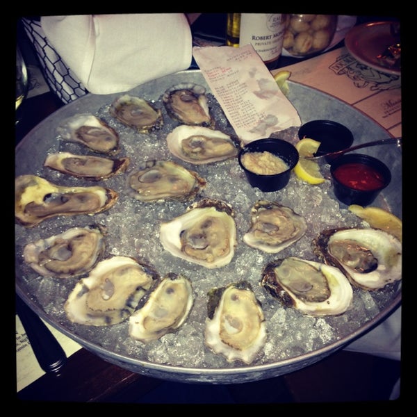 Photo taken at Doc Magrogan&#39;s Oyster House by Lauren F. on 2/4/2013
