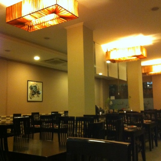 Photo taken at Ming Cocina Asiática by Bingru H. on 11/22/2012