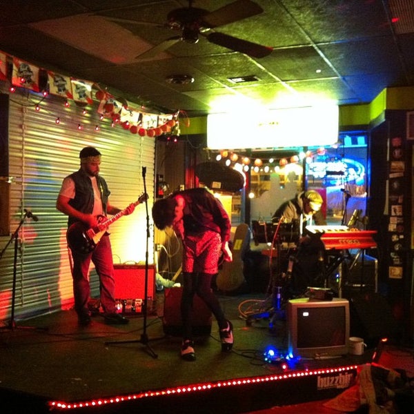 Photo taken at Buzzbin Art &amp; Music Shop by Life(Liss) L. on 2/21/2013