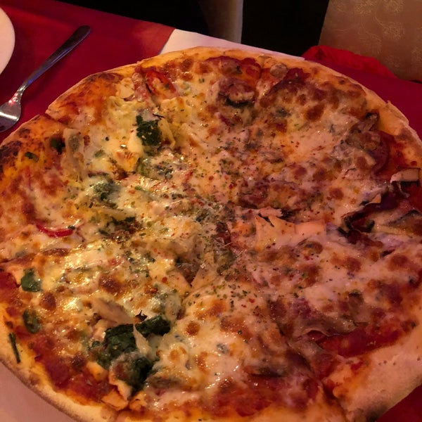 Photo taken at Sokullu Pizza &amp; Restaurant by Erick B. on 4/8/2018