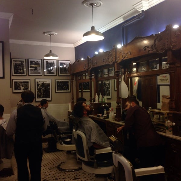 Photo taken at Neighborhood Cut and Shave Barber Shop by Kevin R. on 10/27/2014