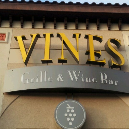 Photo taken at Vines Grille &amp; Wine Bar by Marsha C. on 1/15/2013