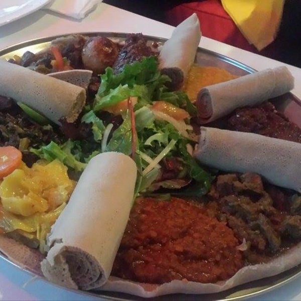 Photo taken at Lucy Ethiopian Restaurant &amp; Lounge by Shahir A. on 6/7/2015