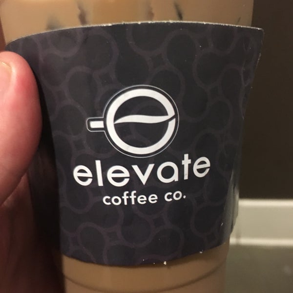Photo taken at Elevate Coffee Company by Chris H. on 7/22/2019