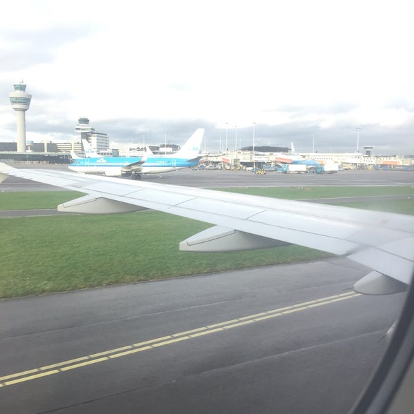 Photo taken at Amsterdam Airport Schiphol (AMS) by Mileymild Q. on 12/21/2015