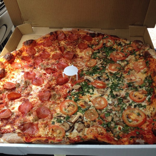 Photo taken at Kaimuki&#39;s Boston Style Pizza by Connie N. on 4/25/2014