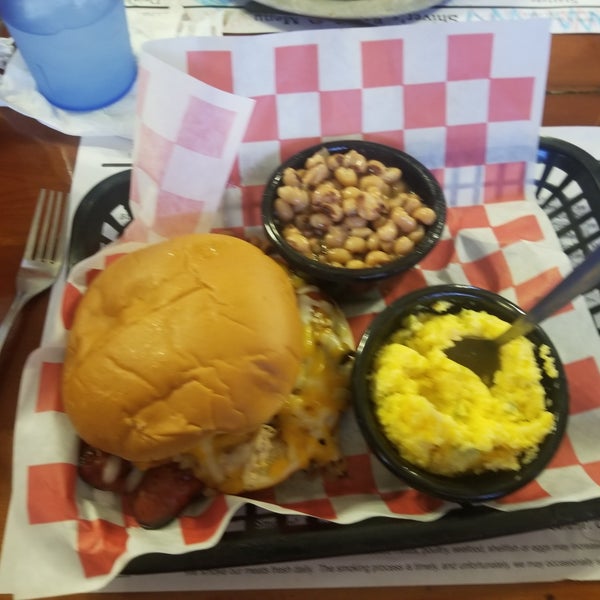 Sausage Bomb sandwich, cheese jalapeno grits have just enough zing, black eye peas cooked. Family bench style seating. All food was good.
