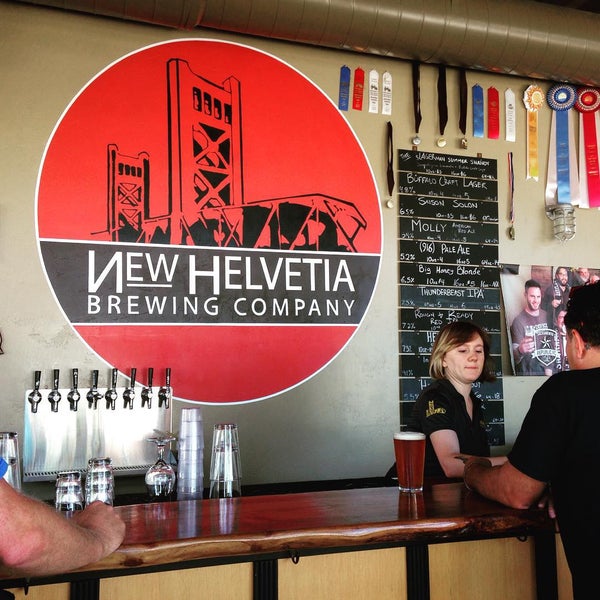 Photo taken at New Helvetia Brewing Co. by Crystal C. on 7/3/2015