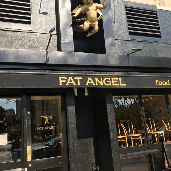 Photo taken at Fat Angel Food &amp; Libation by Savio Y. on 10/18/2017