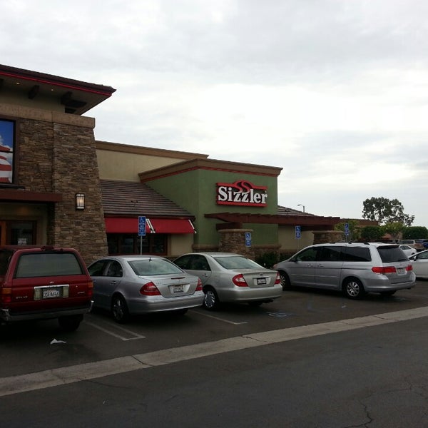 Photo taken at Sizzler by Michael G. on 7/11/2013