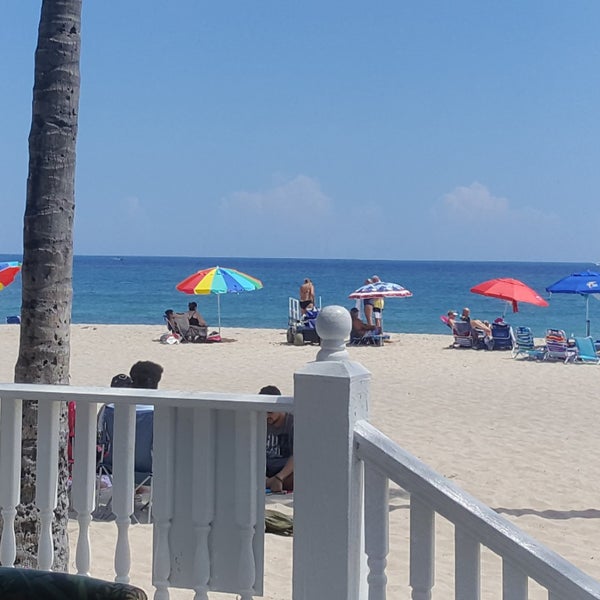 Photo taken at Aruba Beach Cafe by T. T. on 9/17/2019