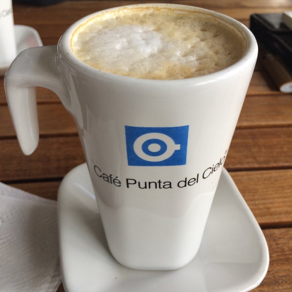 Photo taken at Café Punta del Cielo by Javier C. on 12/16/2014