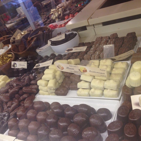 Photo taken at Leonidas Chocolate by Lisa A. on 7/9/2015