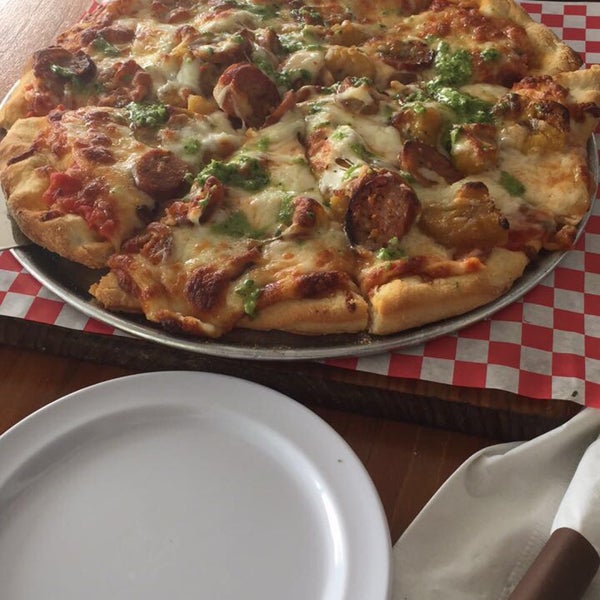 Divina Comedia Pizza Medium size: mozzarella, puertorrican longaniza, amarillos, pomodoro sauce